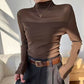 Top de malla de cuello alto para mujer