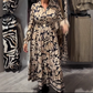 Vestido elegante de manga larga con estampado floral